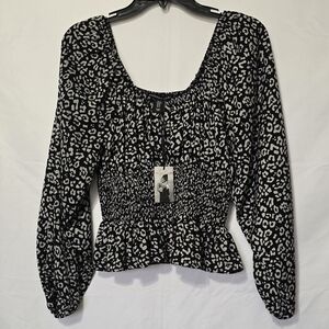 Sincerely Jules leopard print smocked blouse top in black and white.